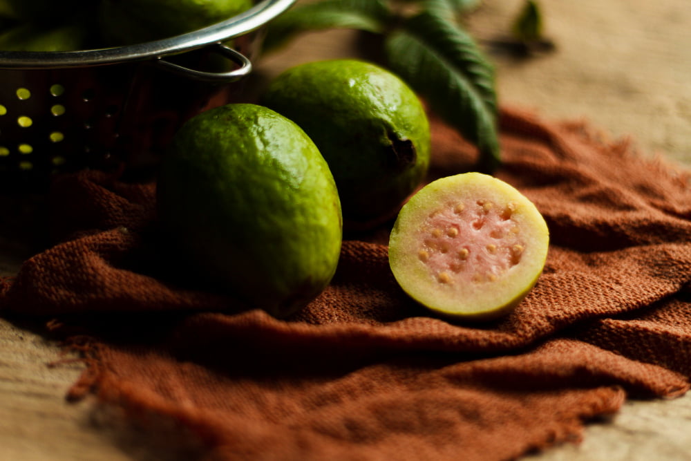 close up cut guava fruits plate